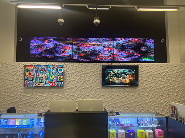 A product display and some TV screens in our shop